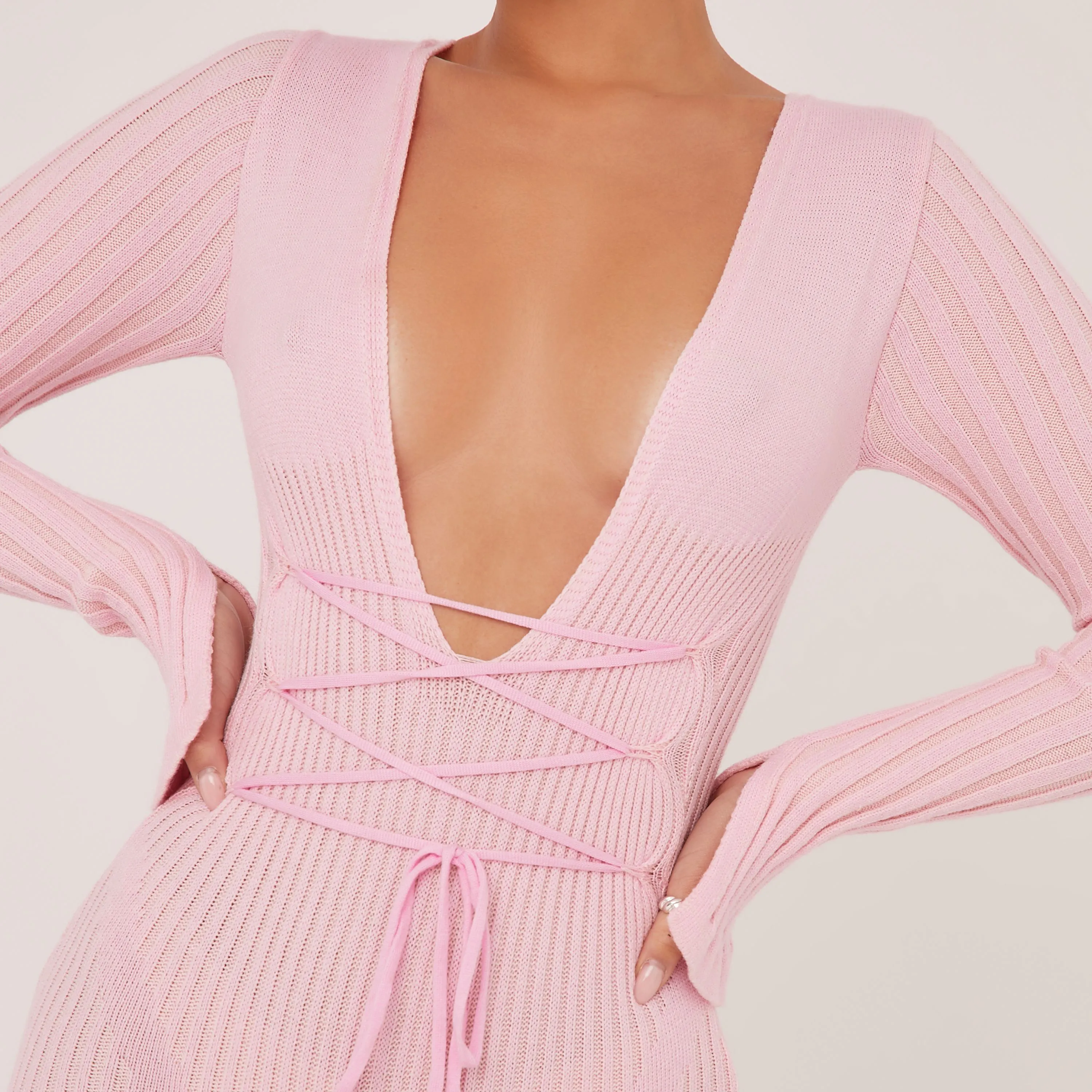 Long Sleeve Plunge Strappy Waist Playsuit In Contrast Pastel Pink Knit