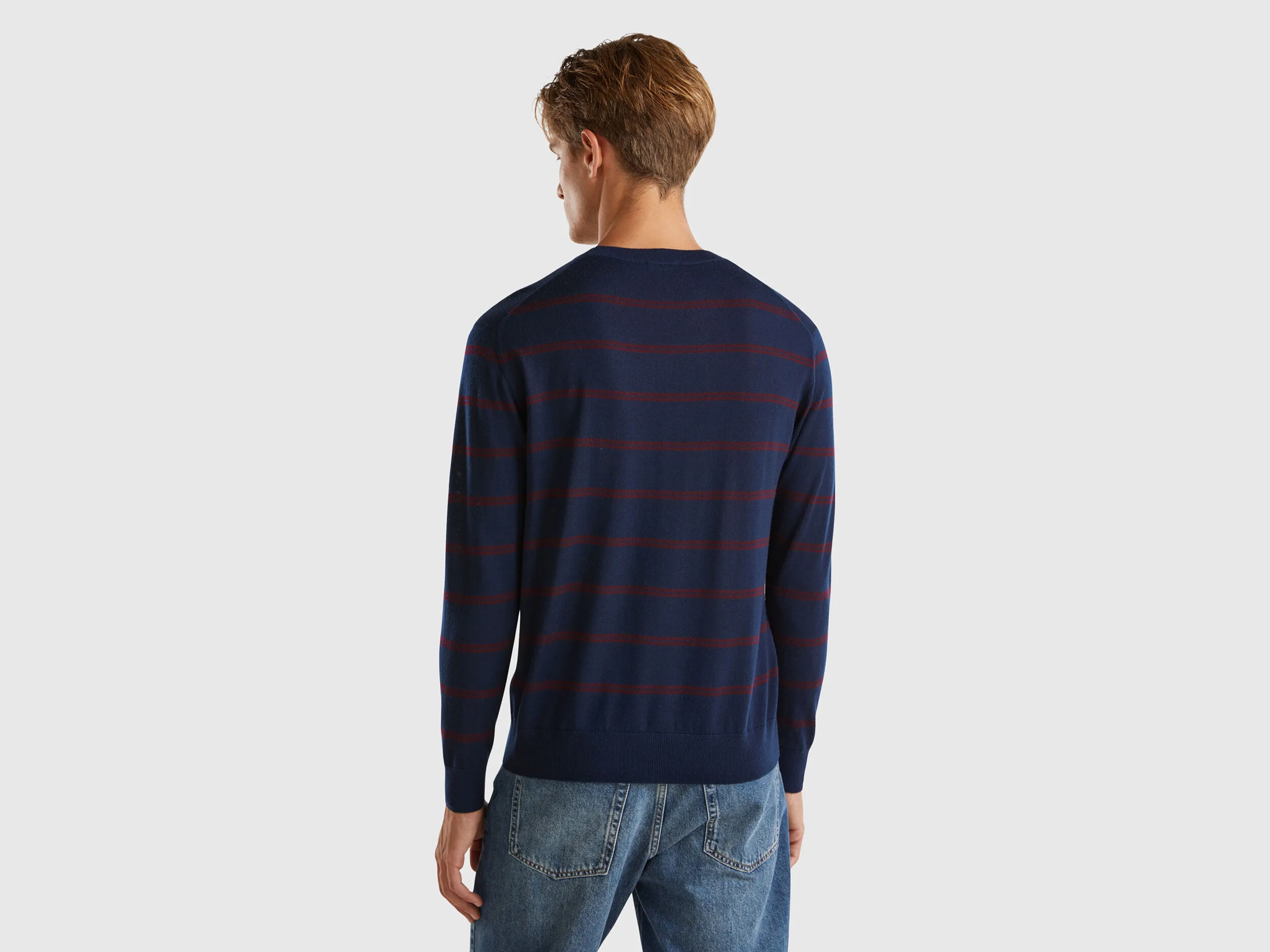 Striped sweater in pure Merino wool - Dark Blue | Benetton